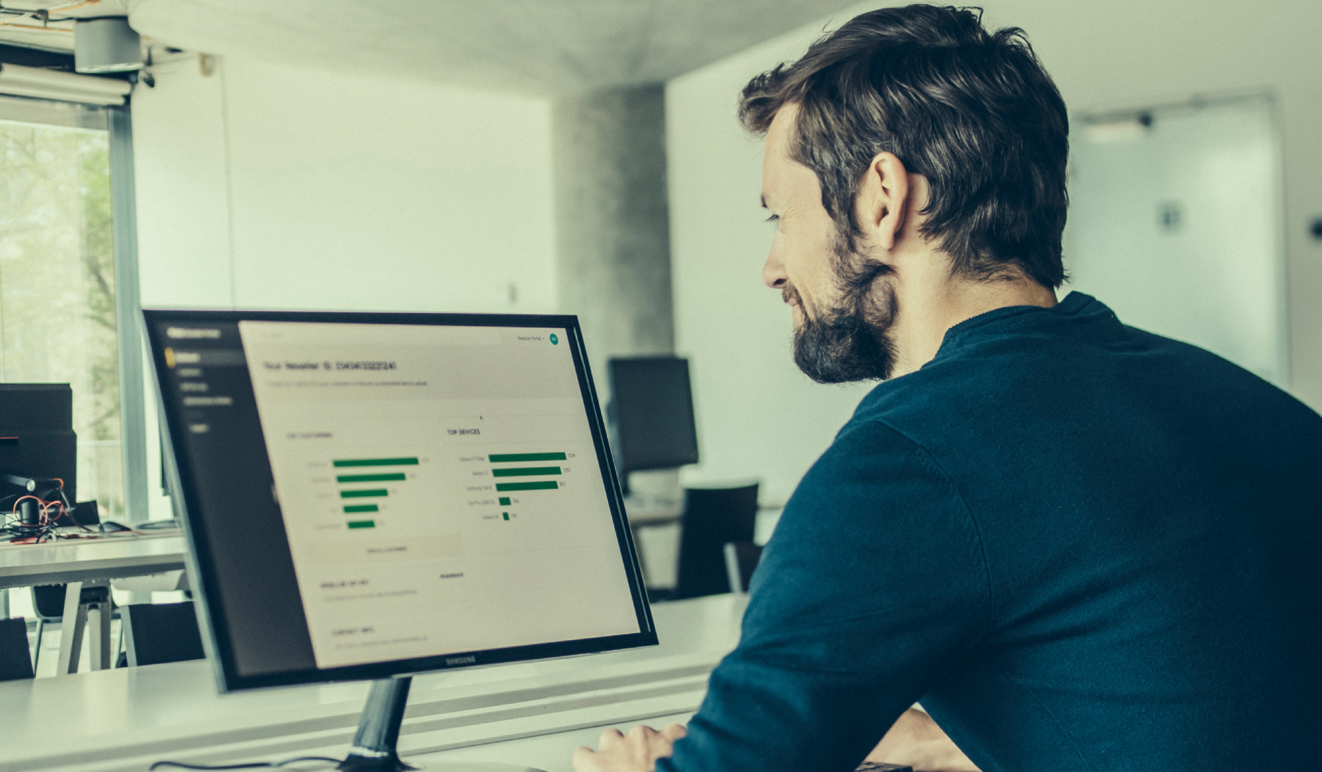 Person viewing the Knox Admin Portal dashboard on a desktop monitor